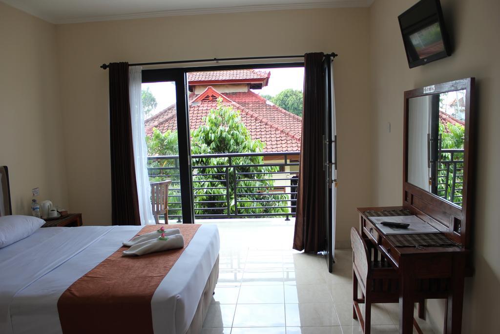 Hotel Puri Nusantara Кута Экстерьер фото